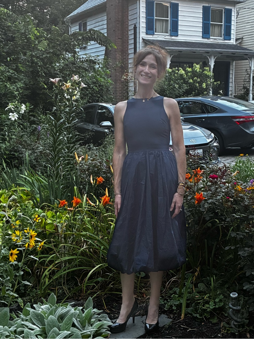 Sleeveless Navy Midi Dress with Fitted Bodice and bubble hem